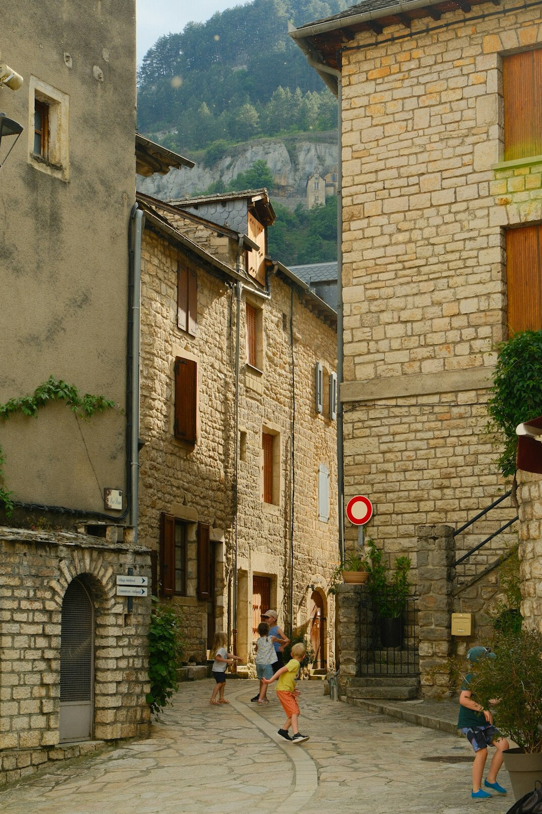 Children playing in a narrow village street