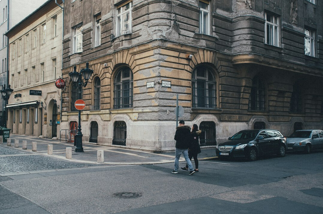 Residents talking on a city street corner